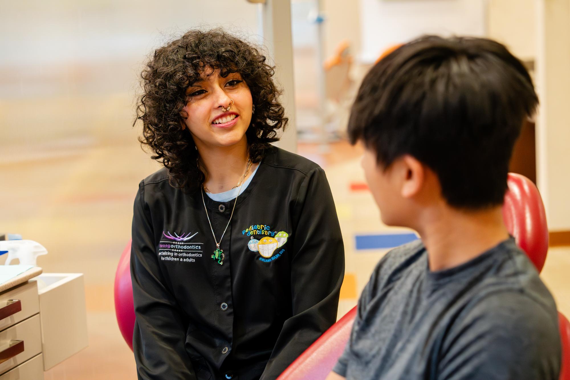 Kwong Orthodontics team member with patient